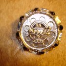 Large silver metal button with Noah's arc and black beads. Large silver metal button with Noah's arc and black beads.