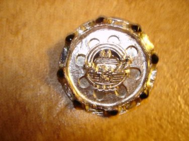 Large silver metal button with Noah's arc and black beads.