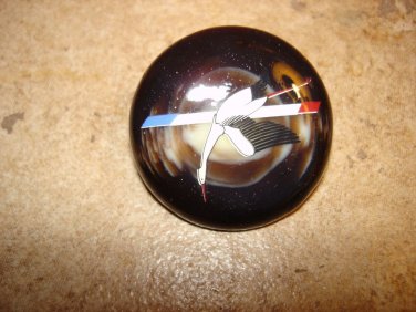 Large button with white goose.