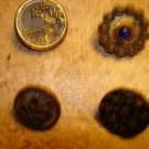 Lot of 4 antique picture buttons peackock eye & other.