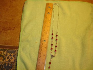 Necklace with glass beads and red tiny rhinestones.