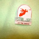 Festival of lights at the Grotto plastic pin back pin. Festival of lights at the Grotto plastic pin back pin.