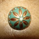 Art nouveau dome shape metal button.