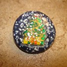 Beautiful Christmas button with Christmas tree and snowflakes.
