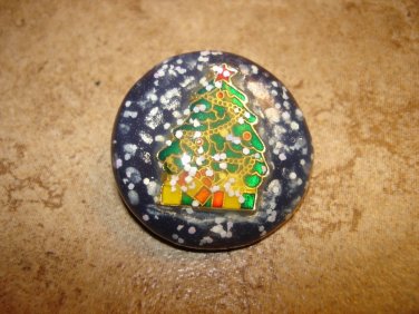 Beautiful Christmas button with Christmas tree and snowflakes.