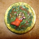 Large lucite button with Christmas stocking. Large lucite button with Christmas stocking.