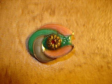 Oval shape metal button with red rhinestone.