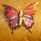 Gold metal and cloisonne button in shape of butterfly. Gold metal and cloisonne button in shape of butterfly.