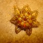 Beautiful floral button made out of tiny beads.