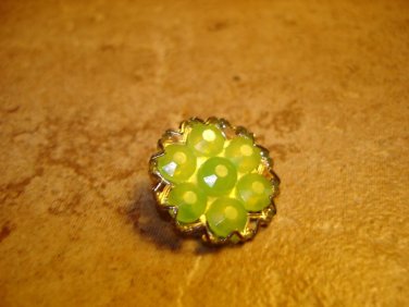 Lovely silver metal button with green glass beads.