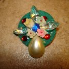Signed metal button with glass beads, pearl, flowers and rhinestones. Signed metal button with glass beads, pearl, flowers and rhinestones.