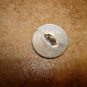 Signed silver metal button with green flower.