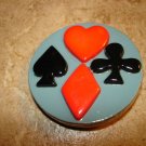Large gaming wood button with cards.