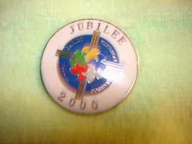 Large silver metal button with 2000 Jubilee Christ yesterday logo.