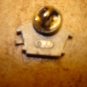 All metal bird house with little bird pin back badge.