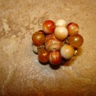 Vintage gold metal  button with earth color beads.