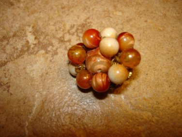 Vintage gold metal  button with earth color beads.