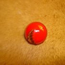 Old red glass button with gold leaf. Old red glass button with gold leaf.