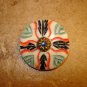 Large carved colorful faux bone button with rhinestone.