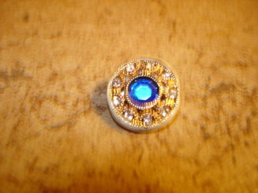 Beatiful gold tone metal button with large blue rhinestone