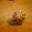 Vintage button with small pearls and metal back.