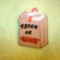 All metal pin back pin Trick or treat.