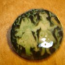Paper mache button with European dancers signed by artist.