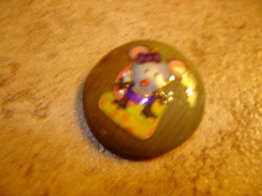 Vegetable ivory La Mode B.B. Co button with mouse.