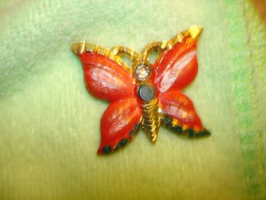 All metal butterly shape button.