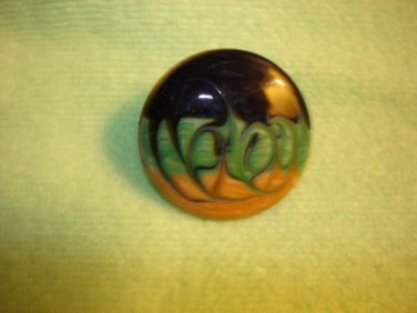 Large art nouveau style yellow, green black metal button.