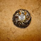 Vintage cut steel pewter button with rhinestone.