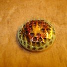 Painted pewter metal button.