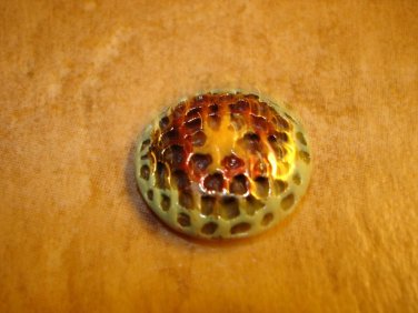 Painted pewter metal button.