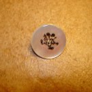 Mother of pearl button with Mickey Mouse picture.