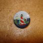 Nicely painted button with lighhouse.