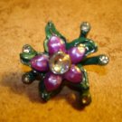 Pewter flower shape painted metal button with rhinestones.