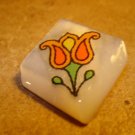 Gorgeous large square shape mother of pearl button with tulip. Gorgeous large square shape mother of pearl button with tulip.