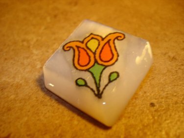 Gorgeous large square shape mother of pearl button with tulip.