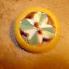 Nicely painted plastic button with tiny rhinestones. Nicely painted plastic button with tiny rhinestones.