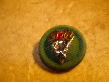 Vintage metal & cloth button with gold leaf and rhinestone.