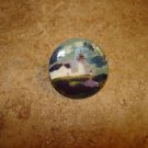 Pretty as picture mother of pearl button with lighthouse.