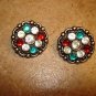Set of 2 Christmas buttons with red, green and white rhinestones.