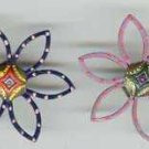 Set of 2 vintage flower shape art deco buttons.