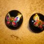Lot of 2 black plastic buttons with colorful butterflies.