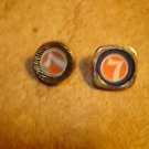 Set of 2 metalized plastic advertising buttons for Lionels trains.
