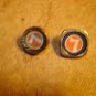 Set of 2 metalized plastic advertising buttons for Lionels trains.