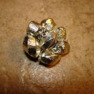 Vintage metal button with silver color beads.