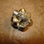 Vintage metal button with silver color beads.