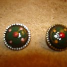 Set of 2 nicely painted old metal buttons.
