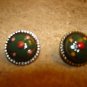 Set of 2 nicely painted old metal buttons.